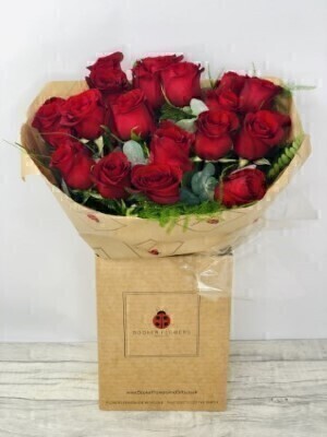 <h2>20 Red Rose Bouquet - Hand-Delivered</h2>
<br>
<ul>
<li>Approximate Dimensions: 50cm x 48cm</li>
<li>Flowers arranged by hand and gift wrapped in our signature eco-friendly packaging and finished off with a hidden wooden ladybird</li>
<li>To give you the best occasionally we may make substitutes</li>
<li>Our flowers backed by our 7 days freshness guarantee</li>
<li>For delivery area coverage see below</li>
</ul>
<br>
<h2>Flower Delivery Coverage</h2>
<p>Our shop delivers flowers to the following Liverpool postcodes L1 L2 L3 L4 L5 L6 L7 L8 L11 L12 L13 L14 L15 L16 L17 L18 L19 L24 L25 L26 L27 L36 L70 If your order is for an area outside of these we can organise delivery for you through our network of florists. We will ask them to make as close as possible to the image but because of the difference in stock and sundry items it may not be exact.</p>
<br>
<h2>Hand-tied Bouquet | 20 Red Roses</h2>
<p>Twenty of the most exquisite long-stemmed large-headed Red Roses will be arranged by hand to create this stunningly hand-tied bouquet which will remain in their heart forever.</p>
<p>The beautiful red roses are hand-arranged by our professional florists into a hand-tied bouquet to make the perfect gift for any occasion.</p>
<p>Handtied bouquets are a lovely display of fresh flowers that have the wow factor. The advantage of having a bouquet made this way is that they are artfully arranged by our florists and tied so that they stay in the display.</p>
<p>They are then gift wrapped and aqua packed in a water bubble so that at no point are the flowers out of water. This means they look their very best on the day they arrive and continue to delight for days after.</p>
<p>Being delivered in a transporter box and in water means the recipient does not need to put the flowers in a vase straight away they can just put them down and enjoy.</p>
<p>Featuring 20 luxury large-headed red roses, together with mixed seasonal foliages.</p>
<br>
<h2>Eco-Friendly Liverpool Florists</h2>
<p>As florists we feel very close earth and want to protect it. Plastic waste is a huge problem in the florist industry so we made the decision to make our packaging eco-friendly.</p>
<p>To achieve this we worked with our packaging supplier to remove the lamination off our boxes and wrap the tops in an Eco Flowerwrap which means it easily compostable or can be fully recycled.</p>
<p>Once you have finished enjoying your flowers from us they will go back into growing more flowers! Only a small amount of plastic is used as a water bubble and this is biodegradable.</p>
<p>Even the sachet of flower food included with your bouquet is compostable.</p>
<p>All our bouquets have small wooden ladybird hidden amongst them so do not forget to spot the ladybird and post a picture on our social media pages to enter our rolling competition.</p>
<br>
<h2>Flowers Guaranteed for 7 Days</h2>
<p>Our 7-day freshness guarantee should give you confidence that we will only send out good quality flowers.</p>
<p>Leave it in our hands we will create a marvellous bouquet which will not only look good on arrival but will continue to delight as the flowers bloom.</p>
<br>
<h2>Liverpool Flower Delivery</h2>
<p>We are open 7 days a week and offer advanced booking flower delivery same-day flower delivery 3-hour flower delivery. Guaranteed AM PM or Evening Flower Delivery and also offer Sunday Flower Delivery.</p>
<p>Our florists deliver in Liverpool and can provide flowers for you in Liverpool Merseyside. And through our network of florists can organise flower deliveries for you nationwide.</p>
<br>
<h2>The Best Florist in Liverpool your local Liverpool Flower Shop</h2>
<p>Come to Booker Flowers and Gifts Liverpool for your beautiful flowers and plants. For that bit of extra luxury we also offer a lovely range of finishing touches such as wines champagne locally crafted Gin and Rum Vases Scented Candles and Chocolates that can be delivered with your flowers.</p>
<p>To see the full range see our extras section.</p>
<p>You can trust Booker Flowers and Gifts of delivery the very best for you.</p>
<p><br /><br /></p>
<p><em>5 Star review on Yell.com</em></p>
<br>
<p><em>Thank you Gemma for your fabulous service. The flowers are of the highest quality and delivered with a warm smile. My sister was delighted. Ordering was simple and the communications were top-notch. I will definitely use your services again.</em></p>